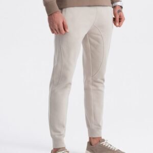 Béžové tepláky s trendy prešívaním V1 PABS-0173