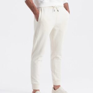 Krémové tepláky s trendy prešívaním  V11 PABS-0173